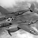 Fresh from the factory, P-38J Yippee, the 5,000th Lightning delivered to the US Army Air Forces, flies over California in 1944. This aircraft was shipped to the Pacific Theater but was subsequently lost in an accident in the Philippines in 1945. (US Air Force)